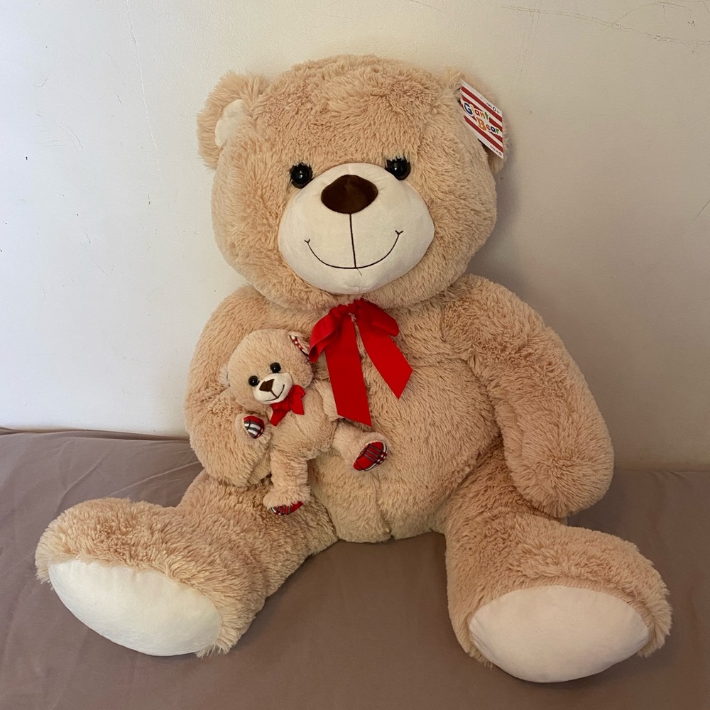 Large stuffed animal plush bear with baby bear